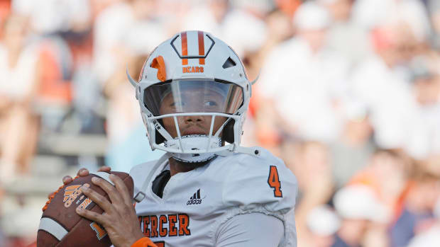 Sep 3, 2022; Auburn, Alabama, USA; Mercer Bears quarterback Fred Payton (4) warms up before the game against the Auburn Tigers at Jordan-Hare Stadium. Mandatory Credit: John Reed-USA TODAY Sports
